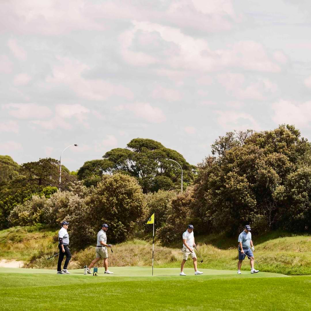 Four men are shown playing golf on a golf course as part of a Lexus Encore golf day promotion. 